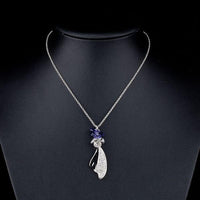 Close up detail of KHAISTA crystal machete pendant necklace