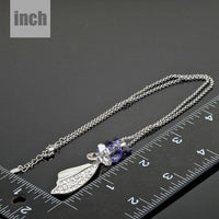 Pendant detail on KHAISTA crystal machete pendant necklace