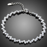 KHAISTA marquise cut CZ tennis bracelet on white background
