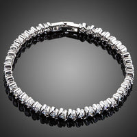 KHAISTA micro round CZ bezel bracelet on white background