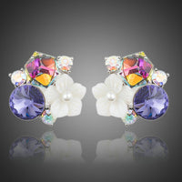 KHAISTA multicolour flower crystal stud earrings on white background