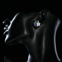Side angle view of KHAISTA multicolour flower crystal stud earrings