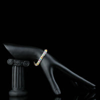 Side angle view of KHAISTA multicolour crystal lobster bracelet