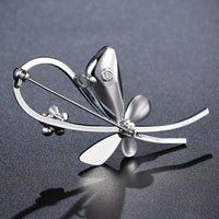 Side angle view of Khaista multicolour plant brooch