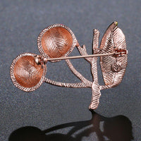 Side angle view of Khaista apple tree brooch