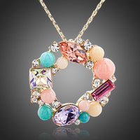 KHAISTA multicolour round crystal pendant necklace on white background