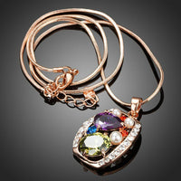 Close up detail of KHAISTA multicolour crystal snake chain necklace