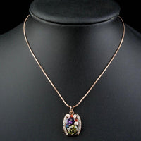 Side angle view of KHAISTA multicolour crystal snake chain necklace