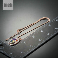 Pendant detail on KHAISTA multicolour crystal snake chain necklace