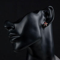 Close up of KHAISTA multicolour Stellux Austrian stud earrings