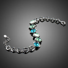 Load image into Gallery viewer, Ocean Crystal Platinum Plated Charm Bracelet - KHAISTA Fashion Jewellery
