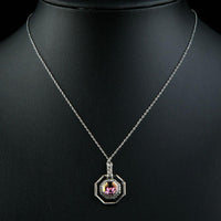 Close up detail of KHAISTA octagon crystal pendant necklace