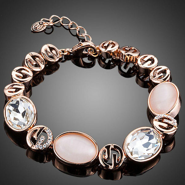 KHAISTA opal crystal lobster bracelet on white background