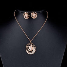 Load image into Gallery viewer, Oval Clip Earrings and Pendant Necklace Set - KHAISTA Fashion Jewellery
