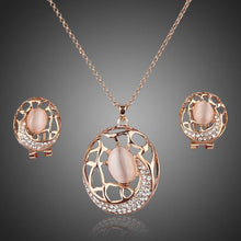Load image into Gallery viewer, Oval Clip Earrings and Pendant Necklace Set - KHAISTA Fashion Jewellery
