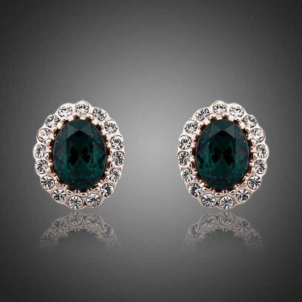 KHAISTA oval ellipse CZ stud earrings on white background