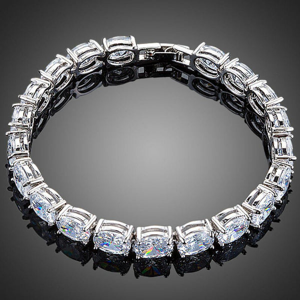 KHAISTA oval CZ tennis bracelet on white background