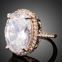 Detailed macro close up view of the brilliant stone settings on this premium oval crystal solitaire ring