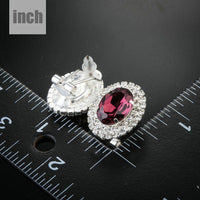 oval maroon CZ stud earrings detail view by KHAISTA