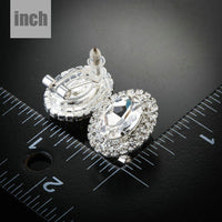 oval silver CZ stud earrings detail view by KHAISTA