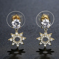 Close up of KHAISTA paved CZ crystal flower drop earrings