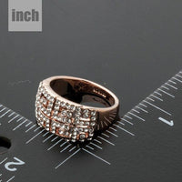 Artistic craftsmanship and structured profiles of the elegant paved crystal cocktail ring