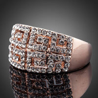 Side angle view highlighting the comfortable band silhouette of the luxury paved crystal cocktail ring