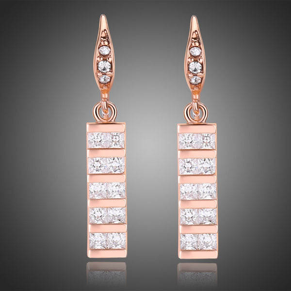KHAISTA paved square cut rectangle drop earrings on white background