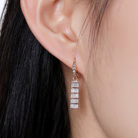 paved square cut rectangle drop earrings detail view by KHAISTA