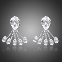Side angle view of KHAISTA crystal paw design drop earrings