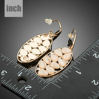 peach crystal oval drop earrings detail view by KHAISTA