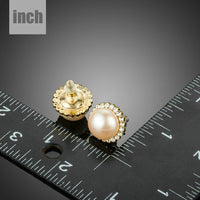 peach pearl dome stud earrings detail view by KHAISTA