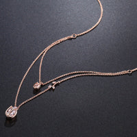 Pendant detail on KHAISTA clear pear cut CZ necklace