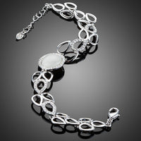 Close up detail of KHAISTA pear cut opal crystal bracelet