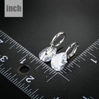 pear shaped CZ drop earrings detail view by KHAISTA