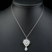 Close up detail of KHAISTA pearl clear waterdrop CZ necklace