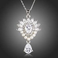 KHAISTA pearl clear waterdrop CZ necklace on white background