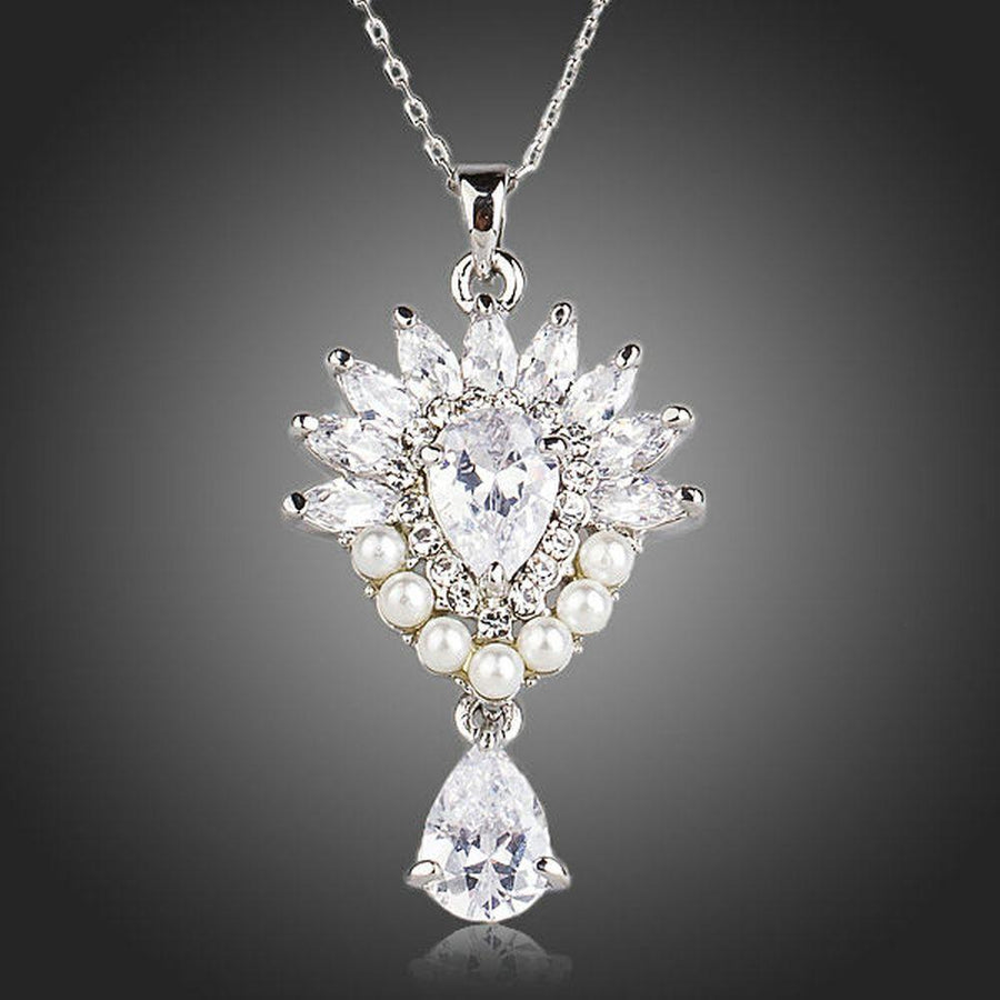 KHAISTA pearl clear waterdrop CZ necklace on white background