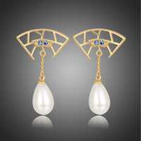 KHAISTA pearl cubic zirconia drop earrings on white background