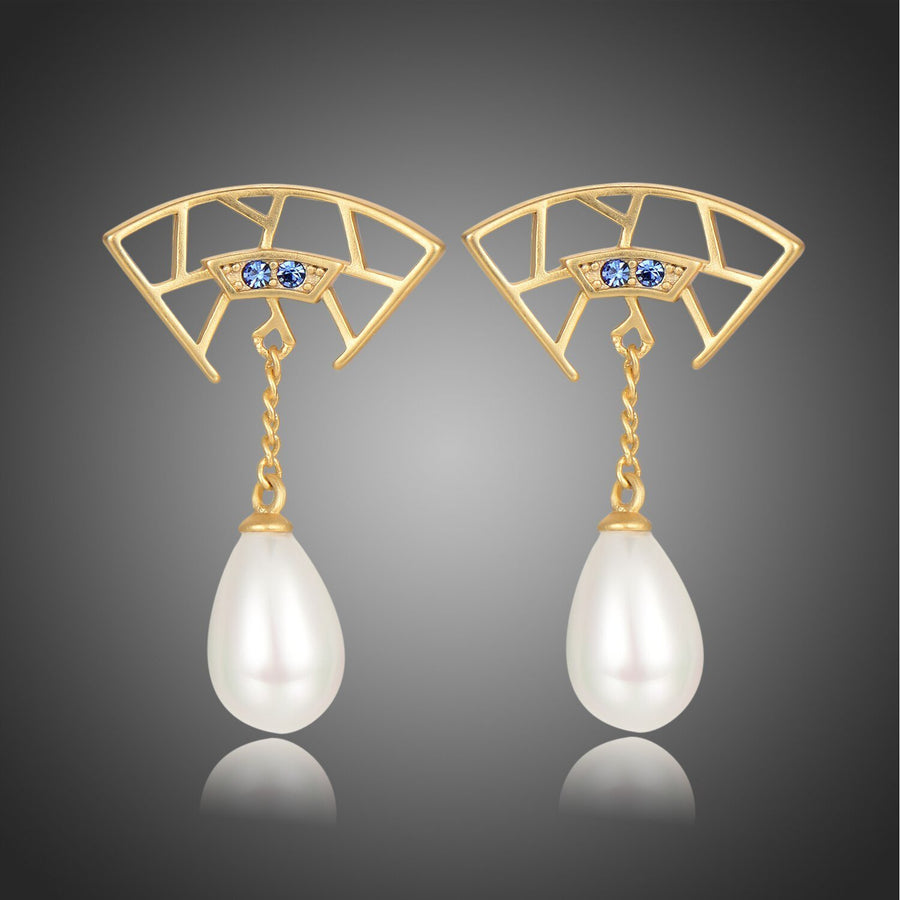 KHAISTA pearl cubic zirconia drop earrings on white background