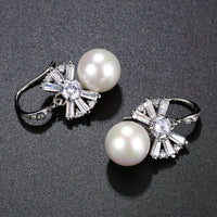 pearl bow knot drop earrings detail view by KHAISTA