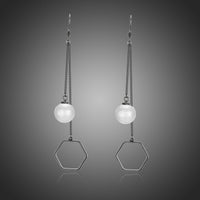 KHAISTA classic pearl drop earrings on white background