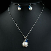 Close-up of blue CZ and pearl on Khaista floral set
