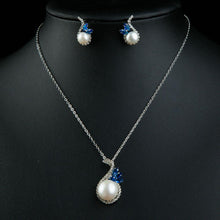 Load image into Gallery viewer, Pearl Fashion Blue CZ Flower Stud Earrings and Necklace Set - KHAISTA Fashion Jewellery
