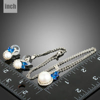 Floral stud detail on Khaista blue CZ pearl set