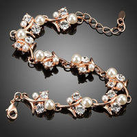 Close up detail of KHAISTA pearl flower crystal bracelet