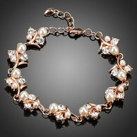 KHAISTA pearl flower crystal bracelet on white background