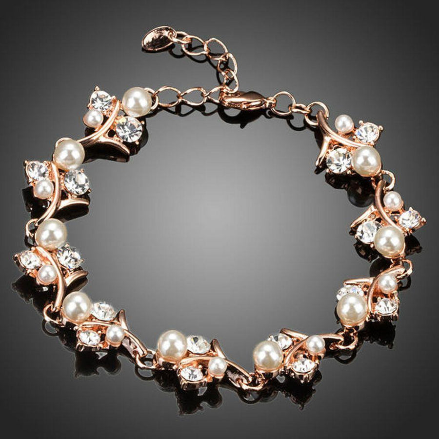 KHAISTA pearl flower crystal bracelet on white background