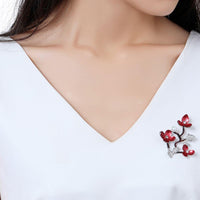 Close-up of pearl stones on Khaista plum blossom brooch