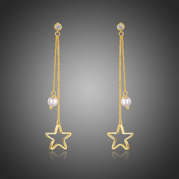 KHAISTA pentagram crystal drop earrings on white background